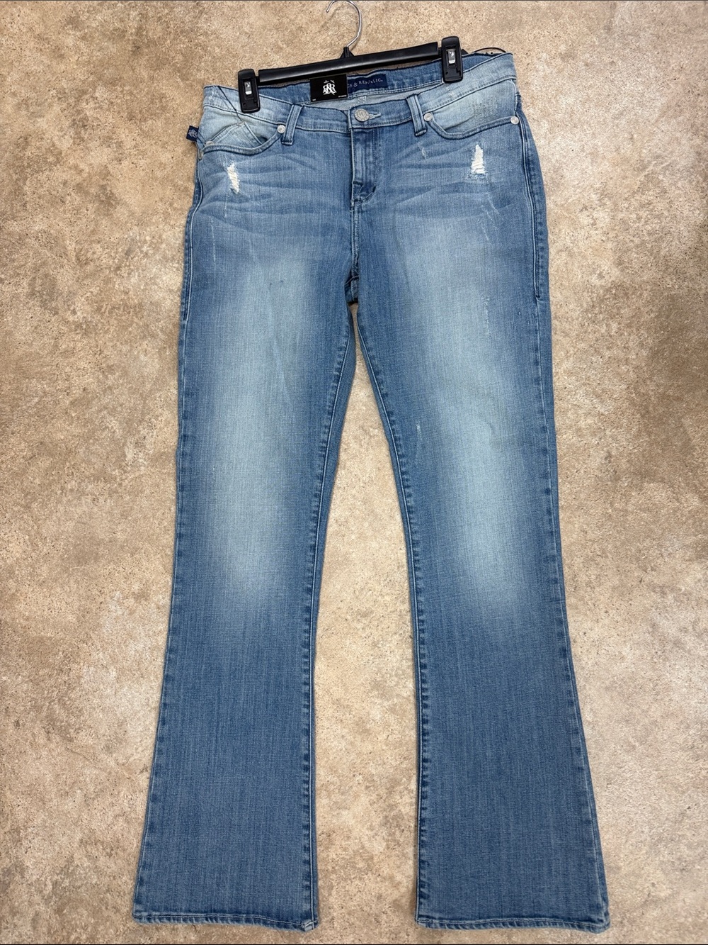Rock & Republic Light Blue Flare Jeans with Subtle Distress